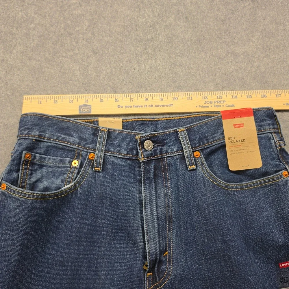 NWT Levis 550 Relaxed Fit Mens Jeans 33x34 Medium Wash Blue Denim 00550-4886